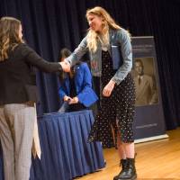 Emily shaking hands with Amanda Witsaman